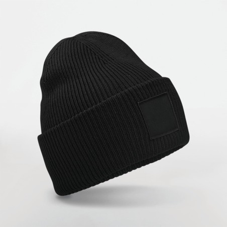 Bonnet à large revers avec patch ton sur ton